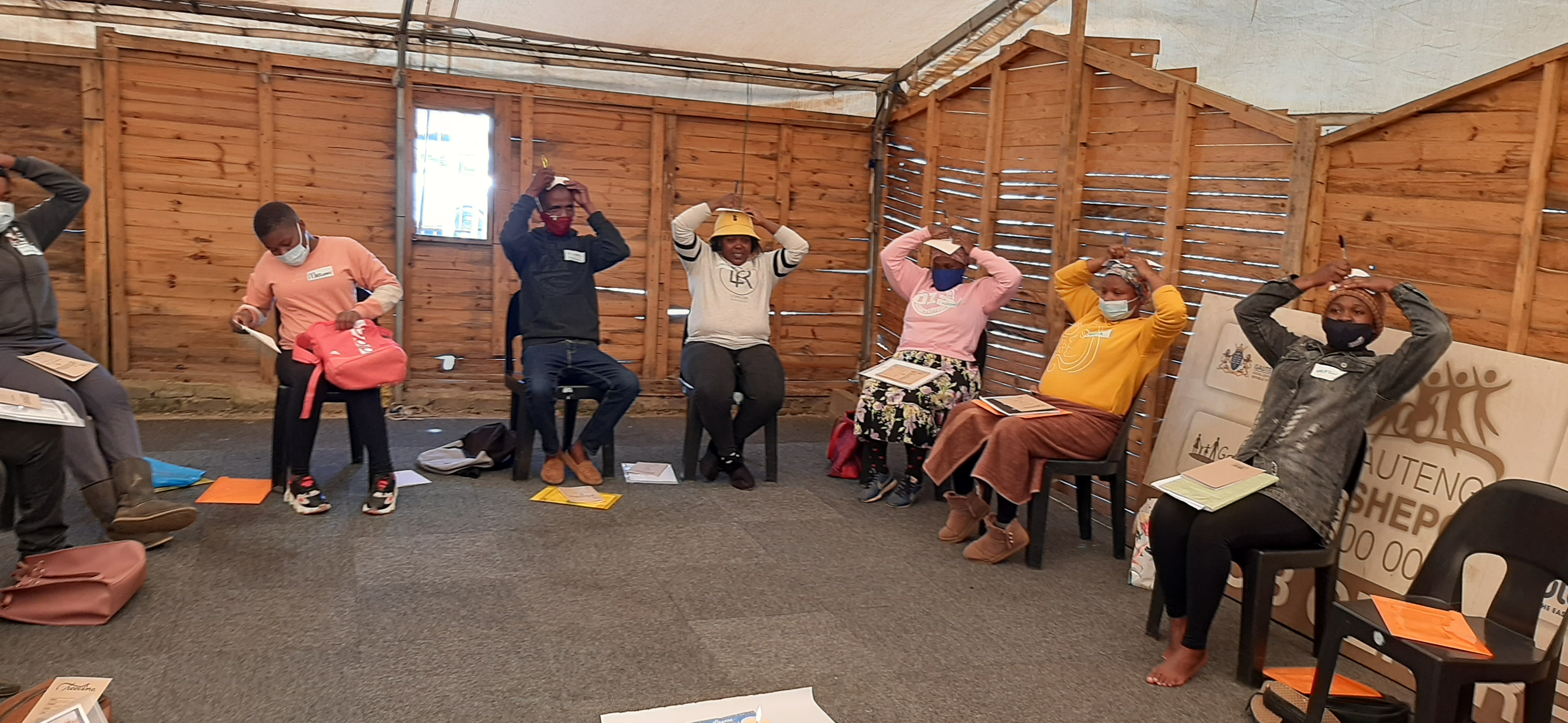 Participants engaging in inner healing activities during the Creators or Peace workshops in Johannesburg. 
